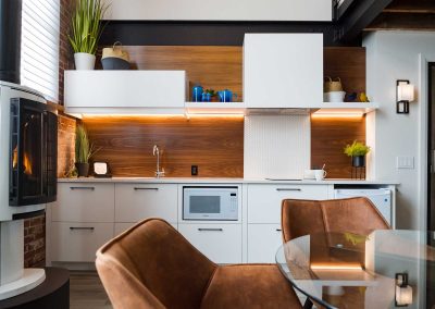 The Wall kitchenette and fireplace